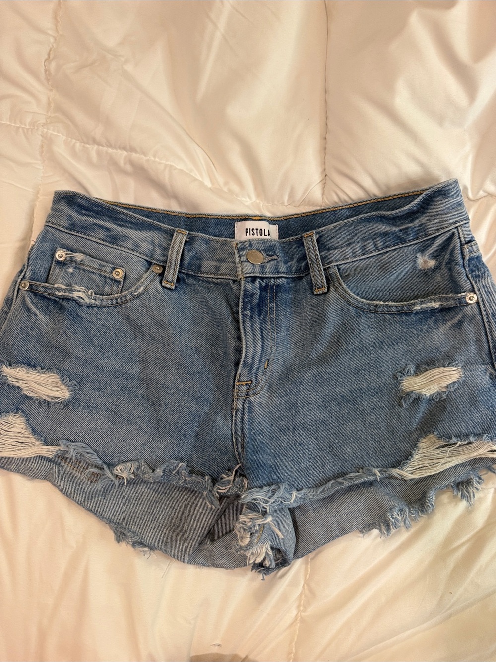 pistola Distressed Denim Cutoff Shorts in Light Blue Wash